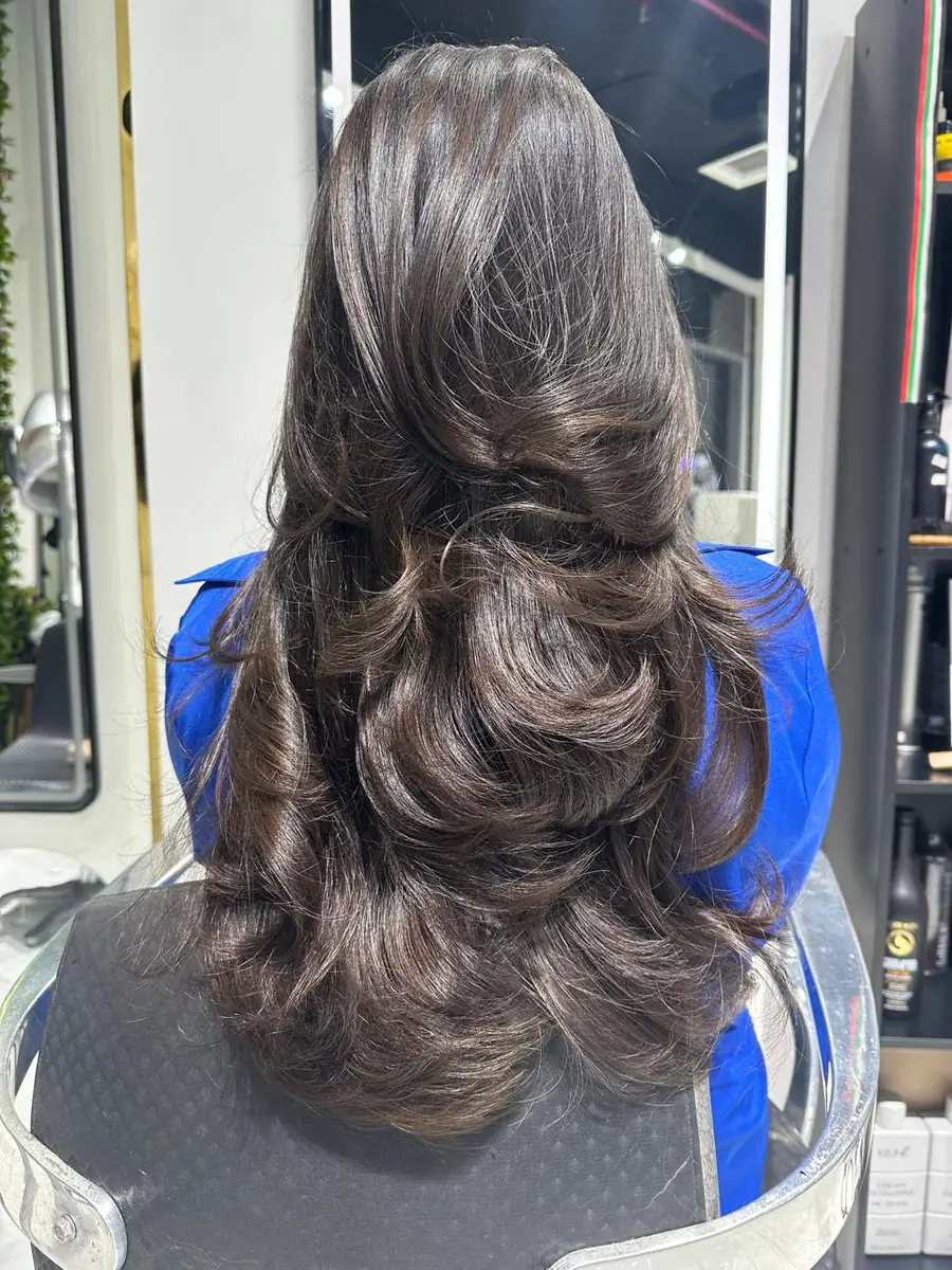 Long layered cut with soft movement